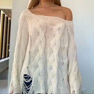 Off the shoulder distressed sweater